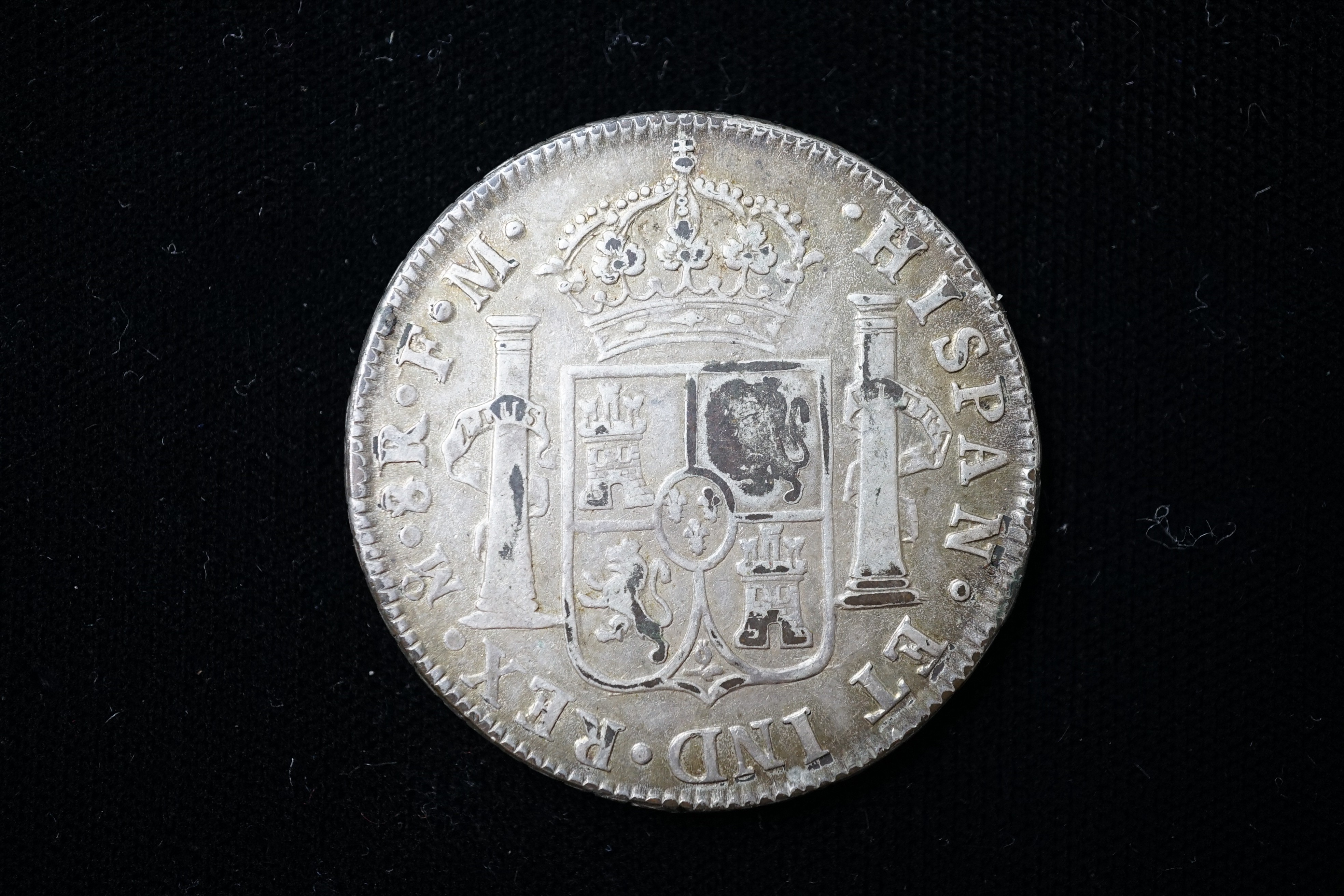 A contemporary copy? - a George III silver dollar, head of George III countermark on a replica of a 1772 Mexico mint 8 Reales, edge knocks otherwise VF